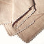Serviettes with macrame trim
